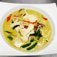 Green Curry · Bell pepper, long bean, green bean, Thai aubergine and basil. Hot and spicy.