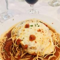 Eggplant Parmigiana · Over spaghetti of choice or vegetables and potatoes.