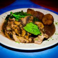 Veal Rossobello · Sauteed with red wine, parsley, and rosemary, topped with mushrooms, served with broccoli ra...