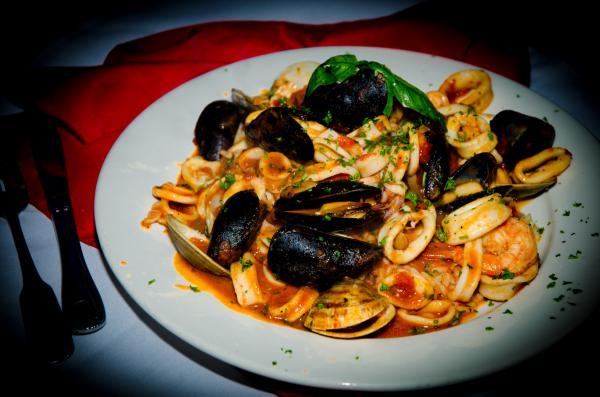 Pasta Pescatore · Calamari, clams, and mussels sauteed in marinara sauce over the pasta of your choice.