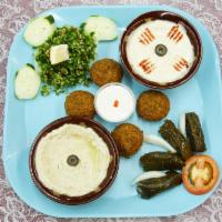 Vegetarian Sampler · Falafel, grape leaves, tabbouleh, hummus and baba ghanouj.