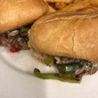 Cheese Steak Sandwich · Shaved Beef Onions Peppers Swiss cheese on a french roll
