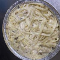 Chicken Alfredo Pasta · Grilled chicken topped with Alfredo sauce.