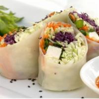 Crystal Rolls with Mixed Herbs · Organic apples, carrots, cabbages, cucumber, tofu and herbs wrapped with rice paper and serv...