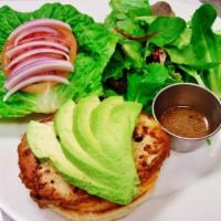 Spicy Tender Burger · Tender soy protein patty, organic tomatoes, lettuce and red onions with pesto and a spicy ma...