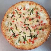 Margherita Delight Pizza · Olive oil and minced garlic. Mozzarella cheese, fresh tomatoes, fresh mozzarella cheese and ...