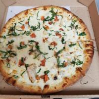 Ranch Chicken Delight Pizza · Ranch sauce, mozzarella cheese, grilled chicken, fresh tomatoes, shredded Parmesan cheese an...