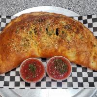 Cheese Calzone · Mozzarella cheese, ricotta cheese and grated Parmesan. Served with 2 sides of marinara sauce.