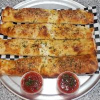 Meat Lovers Strombolis · 4 pieces served with 2 sides of marinara sauce. Mozzarella cheese, pepperoni, Italian sausag...