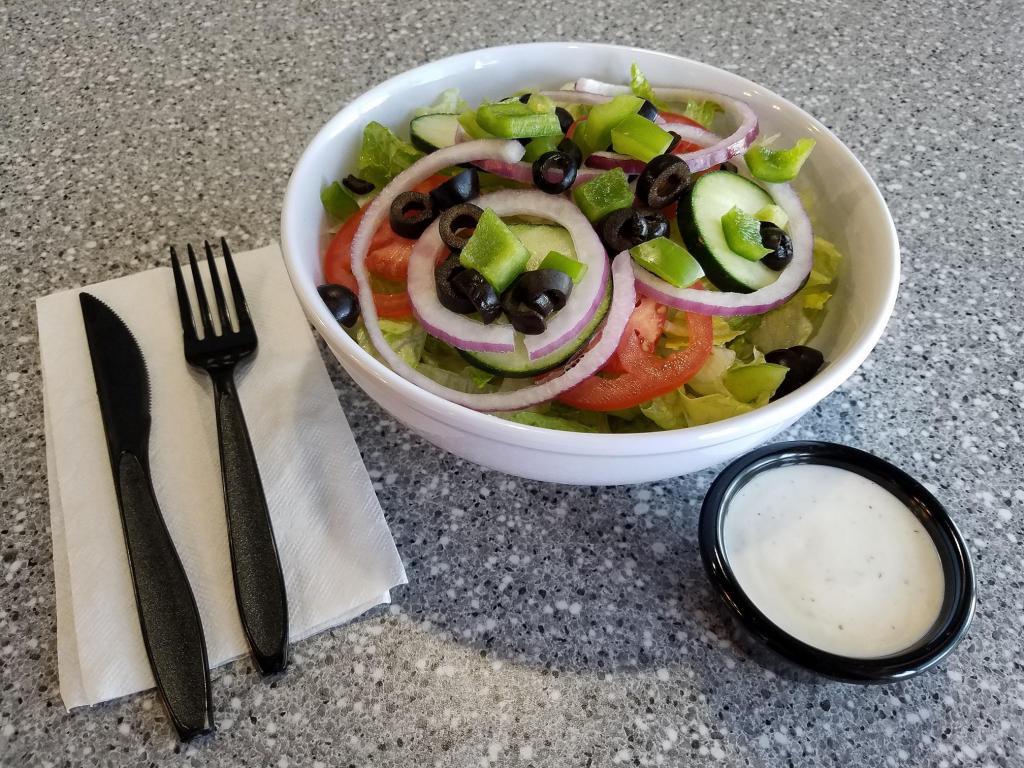 Garden Salad · Romaine, tomatoes, cucumbers, green peppers, red onions and black olives.