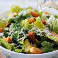 Caesar Salad · Romaine lettuce, tomatoes, croutons and shredded Parmesan cheese.