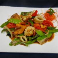 Thai Spicy Basil Seafood · Shrimp, scallop, squid with basil leaves, bell pepper, onion and chili in basil sauce. Spicy.