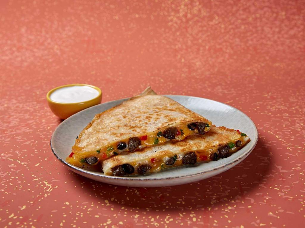 John Coctostan Quesadilla · Served in a grilled 10
