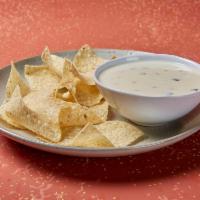 Moe's Famous Queso · Don't miss our mix of 3 all-natural cheese and diced jalapeños. Seriously, it made us famous.