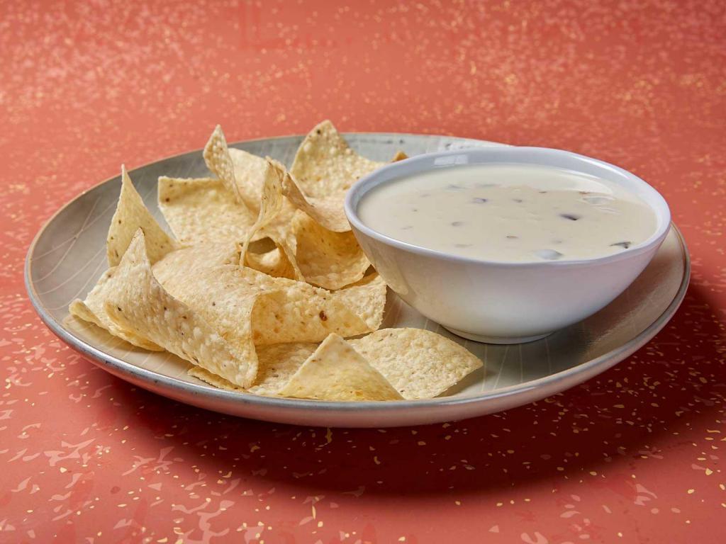 Queso · Moe’s Famous Queso, the perfect partner with made in-house daily free chips or added to any signature entree.