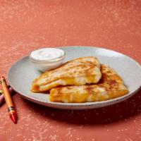 Kid's Mini Masterpiece · Kid sized cheese quesadilla. Comes with your choice of toppings. Served with chips and a sid...