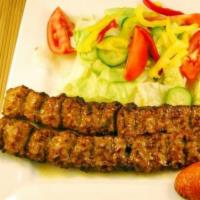 1. Koobideh Kabob · Ground beef skewered and char-broiled.