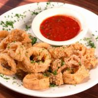 Calamari · Lightly breaded and flash fried to golden crisp. Served with a marinara sauce.