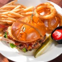 BBQ Burger · With onion rings, cheddar, applewood bacon and BBQ sauce. Served on a brioche bun with lettu...