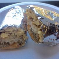 Breakfast Burrito · Scrambled eggs, shredded cheese, hashbrown, choice of: bacon, turkey slice, veggie sausage, ...