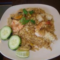37. Seafood Fried Rice · Thai style fried rice with chili paste and seafood.