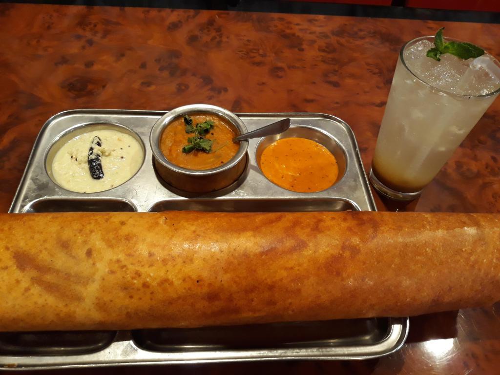 Chicken Tikka Dosa · Rice and Lentil crepe stuffed with chopped chicken tikka.