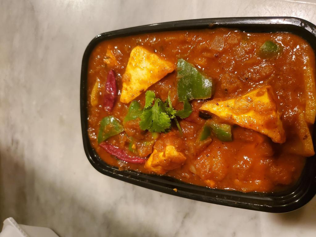 Kapil Da Kadhai Paneer · Diced cottage cheese, onion and green pepper cooked in authored kadhai masala.