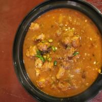 Chicken Curry · Spicy Mumbai style authentic curry cooked with fresh tomatoes, ginger, garlic onion and spic...