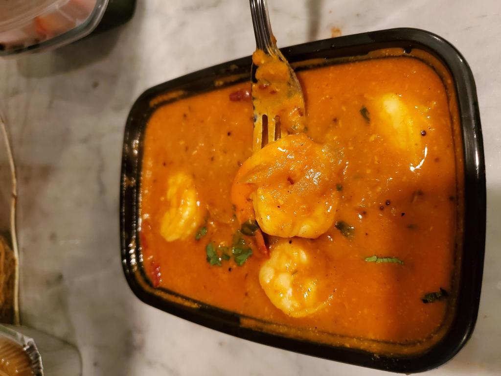 Shrimp Curry · Shrimp cooked in spicy Mumbai style authentic spices.