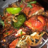 Indian Mixed Grill · Assorted of tandoori chicken, shrimp, chicken tikka, fish tikka and lamb chops served with m...