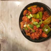 Chicken Manchurian · Boneless chicken stir fried with vegetables and Manchurian sauce.