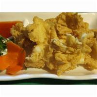Thai Calamari · Fried lightly battered squid served with sweet chili sauce.