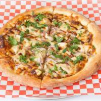 6. BBQ Chicken Pizza · BBQ sauce, chicken, onion, and fresh cilantro with mozzarella cheese.