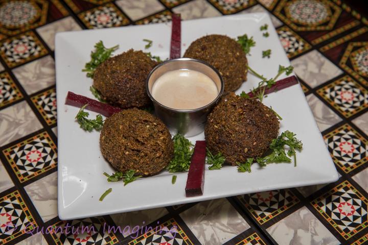 Falafel · Delicious medallions of ground chickpeas with herbs and spice fried to perfection served with a special tahini sauce. Vegan and gluten free.