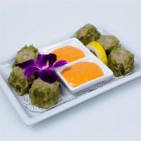 Wasabi Shumai Plate · Steamed or fried, pork dumplings infused with wasabi, drizzled with a spicy aioli.