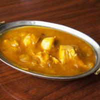 Chicken Mango · Chicken breast cooked with sweet and sour mango sauce and garnished with green herbs. Very d...