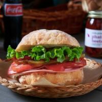 Italian Sandwich - BEST SELLER · Mortadella, cappicolla, genoa salami, provolone, sweet peppers, lettuce, tomato, oregano, ma...