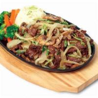 Bulgogi · Thinly sliced tender rib eye beef marinated and aged with a homemade sauce, sauteed with mus...