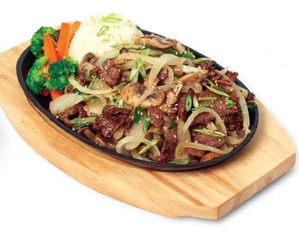 Bulgogi · Thinly sliced tender rib eye beef marinated and aged with a homemade sauce, sauteed with mushrooms and onions. Served with white rice.