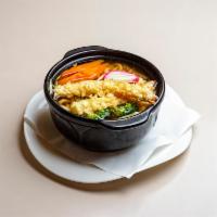 Nabeyaki Udon Hot Pot · Japanese noodles served with chicken, egg, vegetables and shrimp tempura on the side. Served...
