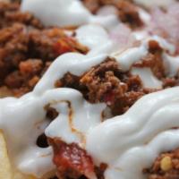 Chili Cheese Fries · Beef chili, Tillamook cheddar, red onion and sour cream.