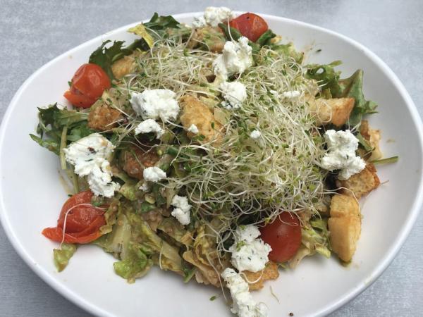 Hippie Salad · Organic mixed greens, lettuce blend, herbed goat cheese, alfalfa sprouts, roasted grape tomatoes, quinoa, garlic croutons tossed with Dijon balsamic.