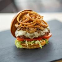 The Counter Burger · All natural beef, provolone, tomatoes, lettuce blend fried onion strings, sauteed mushrooms,...