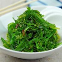 Seaweed Salad · Marinated seaweed mixed with cucumber.