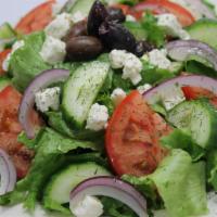 Greek Salad · Lettuce, tomatoes, cucumbers. Red onions, house Greek dressing topped with feta cheese, Gree...
