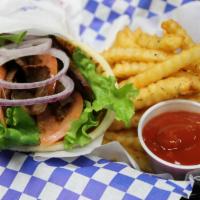 Traditional Gyro Combo · Served with your choice of salad, soup or fries with soda.