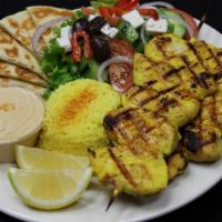Chicken Kebab Plate · Most popular. Grilled chicken breast served with rice, salad, pita bread, hummus and side of...