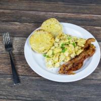 The Works Breakfast · Two eggs any style with toast, home fries and choice of bacon, ham or sausage.