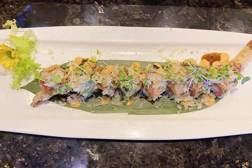 Good Call Roll · Come with shrimp tempura and spicy tuna inside, top with peppered salmon, avocado, jalapeno, crunchy and shichimi powder in spicy mayo and fresh wasabi.