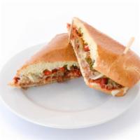 Spicy Italian Sausage Sandwich · Fennel sausage, provolone, mozzarella, spicy cherry peppers, onions, house marinara. Served ...